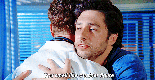 Gif from Scrubs - My Finale: JD hugs Dr Cox and tells him "You smell like a father figure."